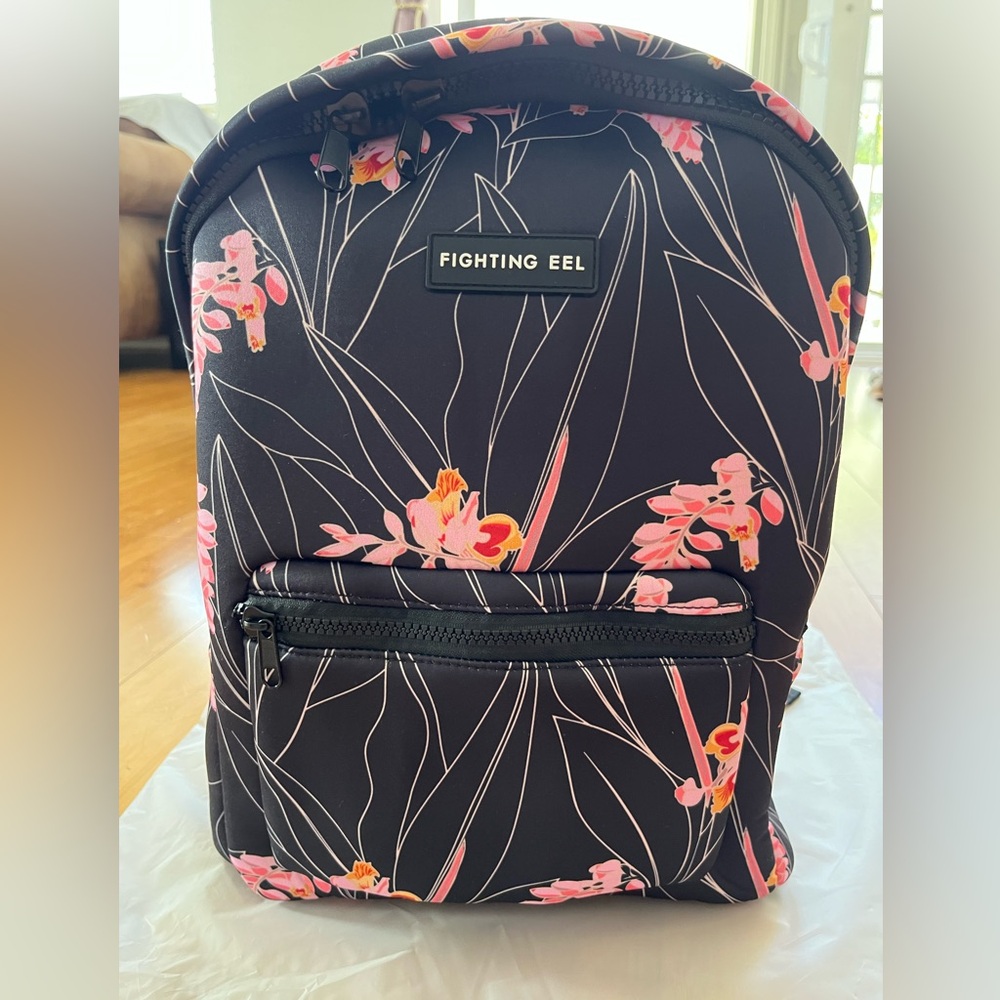 Fighting Eel Neoprene Backpack - Shadow Shell Ginger
New.